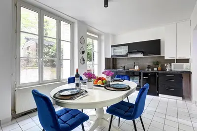 Cuisine ou kitchenette dans l'établissement Le Bellanger - Duplex tout équipé proche Paris