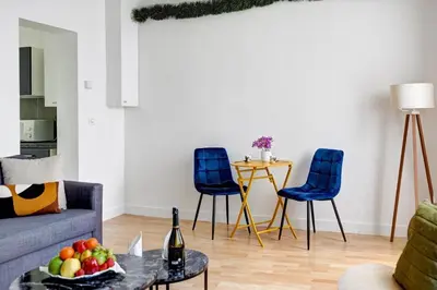 Coin salon dans l'établissement Le Bellanger - Duplex tout équipé proche Paris