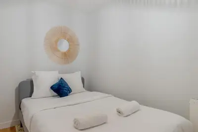 Un ou plusieurs lits dans un hébergement de l'établissement An Enchanting Parisian hideaway