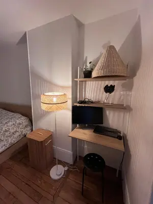 Un ou plusieurs lits dans un hébergement de l'établissement Nid amour Montmartre
