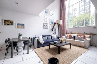 Coin salon dans l'établissement Loft d Exception au Pied des Champs-Élysées