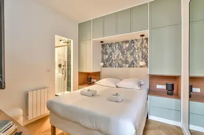 Un ou plusieurs lits dans un hébergement de l'établissement Luxe et Architecture au Centre de Paris pour 6 Pers