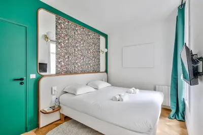 Un ou plusieurs lits dans un hébergement de l'établissement Luxe et Architecture au Centre de Paris pour 6 Pers
