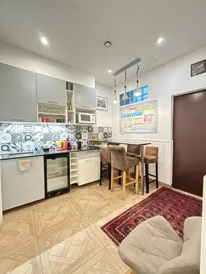 Cuisine ou kitchenette dans l'établissement Charles V Marais Apartment
