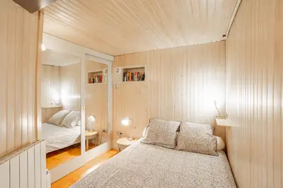 Un ou plusieurs lits dans un hébergement de l'établissement Duplex and private patio at Eiffel Tower