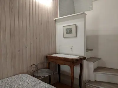 Un ou plusieurs lits dans un hébergement de l'établissement Duplex and private patio at Eiffel Tower