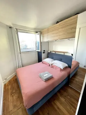 Un ou plusieurs lits dans un hébergement de l'établissement Superbe Loft avec Vue Incroyable sur Montmartre