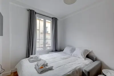 Un ou plusieurs lits dans un hébergement de l'établissement Bluestay 850 - Superb apartment