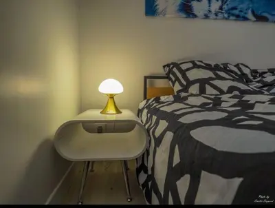 Un ou plusieurs lits dans un hébergement de l'établissement Magnifique appartement, avec climatisation et parking payants