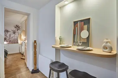 Un ou plusieurs lits dans un hébergement de l'établissement Apartment Eiffel Tower Trocadero by Studio Prestige