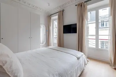 Un ou plusieurs lits dans un hébergement de l'établissement Amazing flat - center of paris