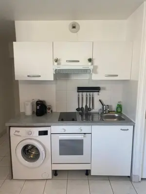 Cuisine ou kitchenette dans l'établissement Appartement 2 pièces avec Projecteur à 100m du métro