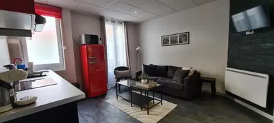 Télévision ou salle de divertissement dans l'établissement L'Urban Clignancourt - Bel appartement tout équipé aux Portes de Paris