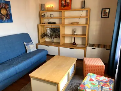 Coin salon dans l'établissement Appartement calme Paris XXeme