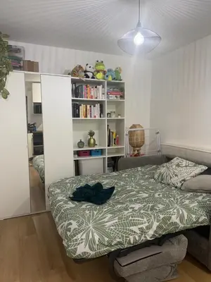 Un ou plusieurs lits dans un hébergement de l'établissement studio paris 13
