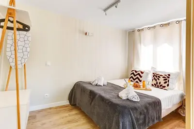 Un ou plusieurs lits dans un hébergement de l'établissement Bluestay 23 - Superb studio in Paris