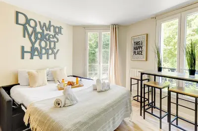 Un ou plusieurs lits dans un hébergement de l'établissement Bluestay 23 - Superb studio in Paris