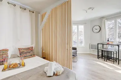 Un ou plusieurs lits dans un hébergement de l'établissement Bluestay 22 - Superb studio in Paris