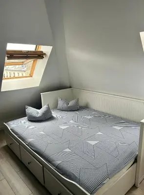 Un ou plusieurs lits dans un hébergement de l'établissement Studio in le Marais SILM