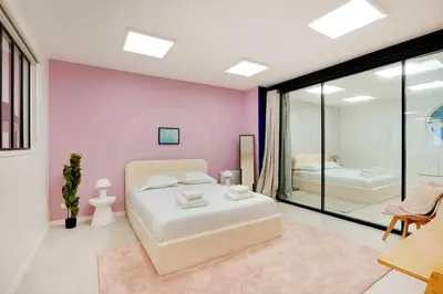 Un ou plusieurs lits dans un hébergement de l'établissement Loft moderne et chic 130 m2- Ménilmontant