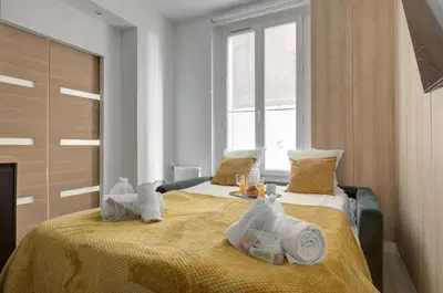 Un ou plusieurs lits dans un hébergement de l'établissement 343 Michau - Cozy apartment near Sacré-Coeur