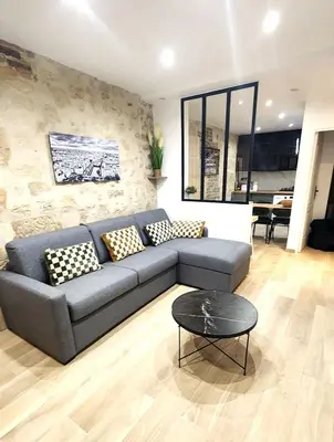 Coin salon dans l'établissement Marais Chatelet - Design & Trendy - 2 suites - 6pax