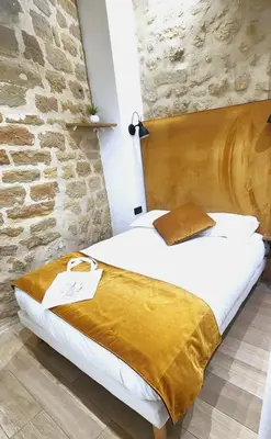 Un ou plusieurs lits dans un hébergement de l'établissement Marais Chatelet - Design & Trendy - 2 suites - 6pax