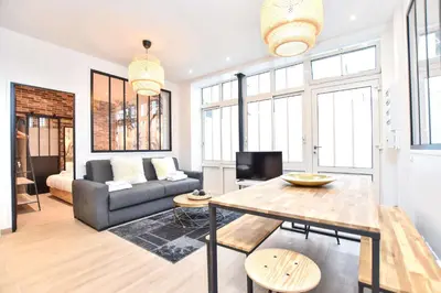 Coin salon dans l'établissement Charmant appartement Paris