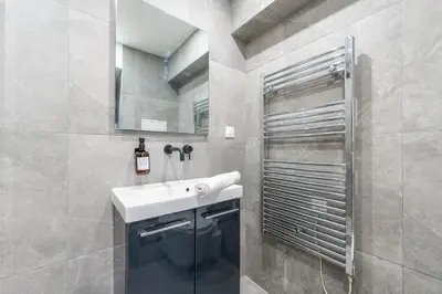 Salle de bains dans l'établissement Appartement Sacré Cœur - Cottages 1