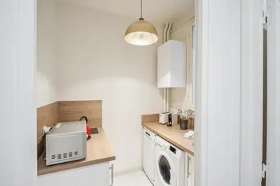 Cuisine ou kitchenette dans l'établissement Studio rue Monsieur - Rive Gauche by B'Your Home