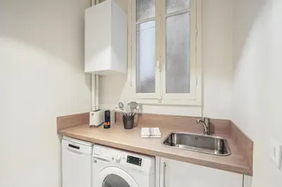 Cuisine ou kitchenette dans l'établissement Studio rue Monsieur - Rive Gauche by B'Your Home