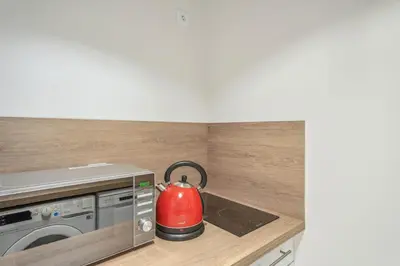 Cuisine ou kitchenette dans l'établissement Studio rue Monsieur - Rive Gauche by B'Your Home