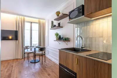 Cuisine ou kitchenette dans l'établissement Villa SoPi Appart'Hotel by Patrick Hayat
