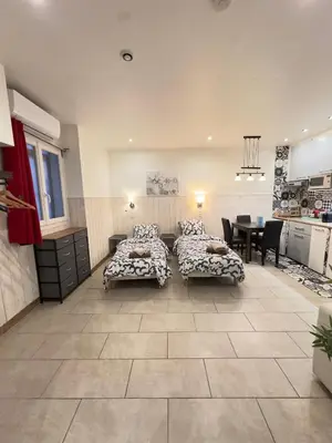 Un ou plusieurs lits dans un hébergement de l'établissement Paris 15 Studio Ground Floor