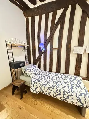 Un ou plusieurs lits dans un hébergement de l'établissement St Paul Marais Flat Ground Floor