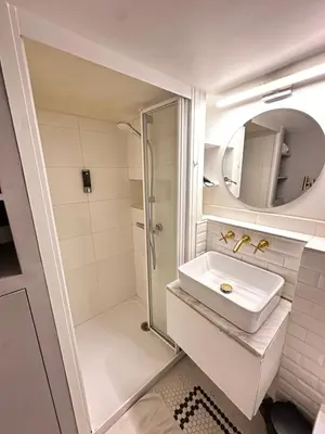 Salle de bains dans l'établissement Cosy Flat In Marais