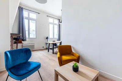Coin salon dans l'établissement GuestReady - Comfortable retreat in the 11th Arr