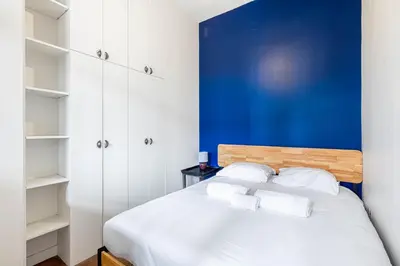 Un ou plusieurs lits dans un hébergement de l'établissement GuestReady - Comfortable retreat in the 11th Arr