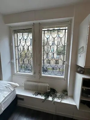 Un ou plusieurs lits dans un hébergement de l'établissement Beautiful Studio Paris Eiffel Tower