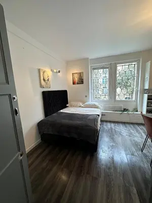 Un ou plusieurs lits dans un hébergement de l'établissement Beautiful Studio Paris Eiffel Tower