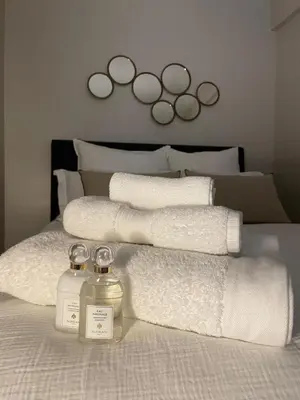 Un ou plusieurs lits dans un hébergement de l'établissement Appartement Swan House Paris Champs Elysée