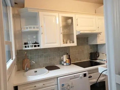 Cuisine ou kitchenette dans l'établissement Appartement 11e