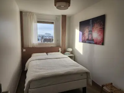 Un ou plusieurs lits dans un hébergement de l'établissement FAMILY APARTMENT's LUXURY 8 guests