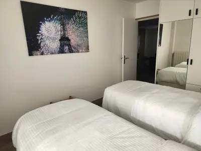 Un ou plusieurs lits dans un hébergement de l'établissement FAMILY APARTMENT's LUXURY 8 guests