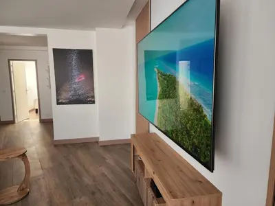 Télévision ou salle de divertissement dans l'établissement FAMILY APARTMENT's LUXURY 8 guests