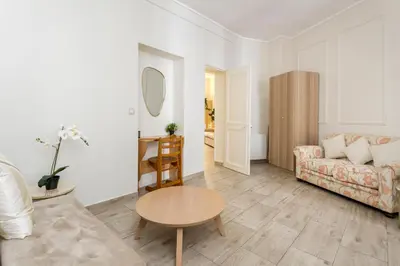 Un ou plusieurs lits dans un hébergement de l'établissement Reva Suites