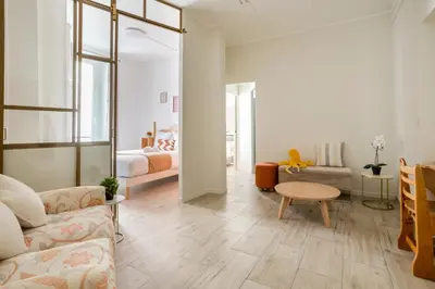 Coin salon dans l'établissement Reva Suites