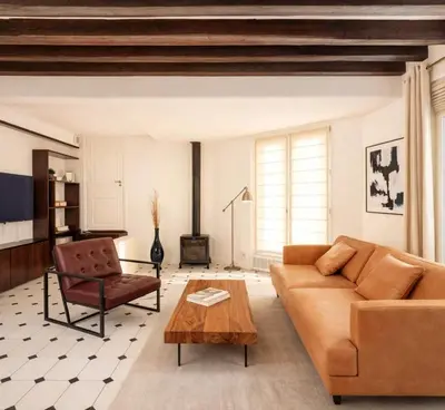 Coin salon dans l'établissement Le Marais - Premium family apartment for 6
