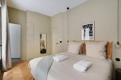 Un ou plusieurs lits dans un hébergement de l'établissement Wonderful Apartment - Bastille