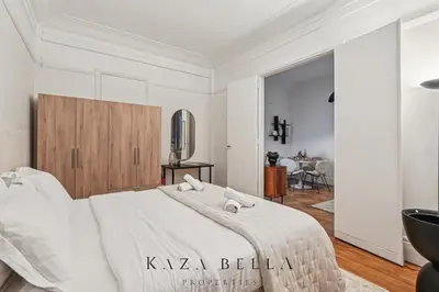 Un ou plusieurs lits dans un hébergement de l'établissement Nice flat in Neuilly sur Seine